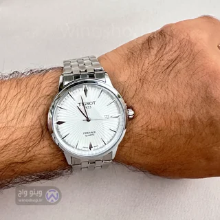 جزئیات صفحه سفید و بند استیل نقره‌ای ساعت مردانه Tissot Presage مدل 1853